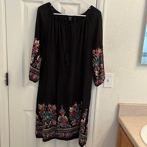 Beautiful black peasant sheath dress with embroidered sleeves and bottom.